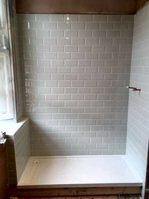 Shower tiling by DVW Decorating Saffron Walden